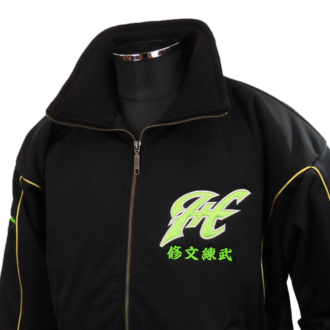 Black zip-up jacket with a neon green logo (letters HL) on the left chest and matching green Japanese characters beneath it.