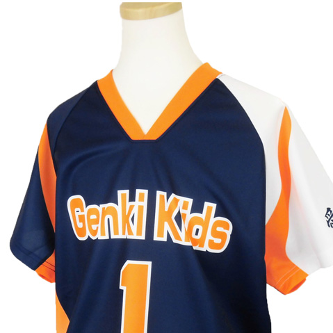 Genki Kids navy blue jersey with orange trim and V-neck, number 1, displayed on a mannequin.