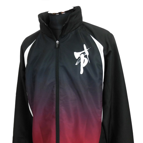 Black athletic zip-up jacket with white side panels and a red-to-navy gradient, standing collar, and a white logo on the left chest.