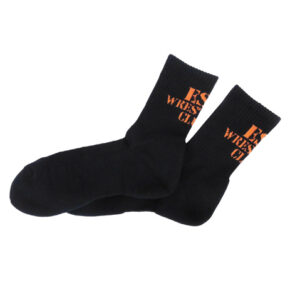 Pair of black socks with orange text on the cuffs, lying overlapped.