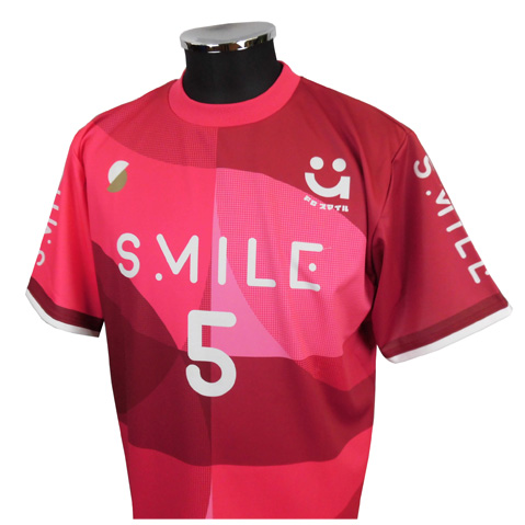 Pink and red athletic jersey on a display mannequin, with the number 5 and 'S.MILE' across the chest and a smile logo.