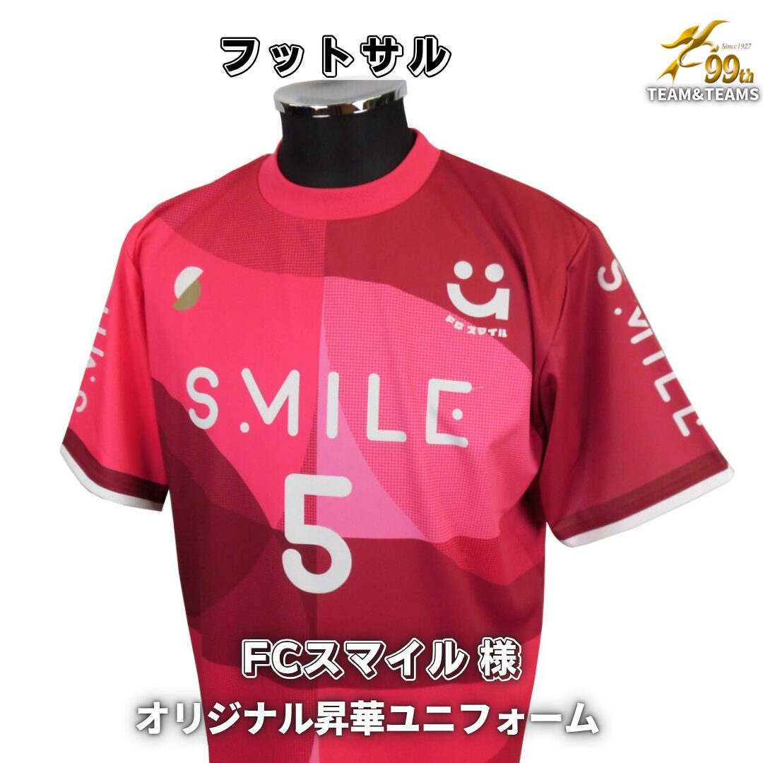 Front view of a bright pink and red sports jersey with the word 'SMILE' and the number 5, plus a small smiley logo on the chest.