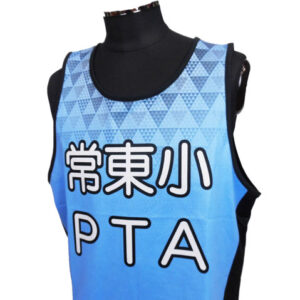 Blue sleeveless sports vest with black trim on a black dress form, displaying Japanese characters and the letters PTA on the front.